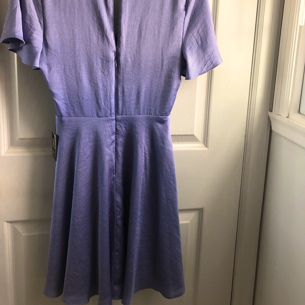 New with tags. Periwinkle midi, size 0 woman’s dress.